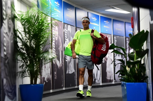 So Mr. Federer came out as normal, pocketbook and racquet bag